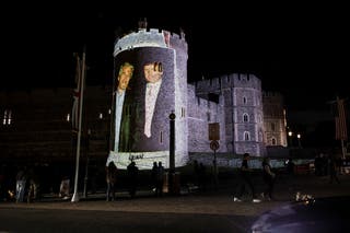 An image of Donald Trump alongside disgraced financier Jeffrey Epstein is projected on Windsor Castle by the campaign group Led By Donkeys on the eve of Donald Trump's welcome